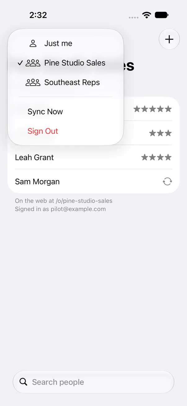 iPhone app menu for switching between a private space, Just me, and two team spaces. Development build with fictional names.